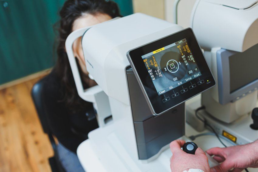 eye examination of a young woman at an ophthalmolo 2025 07 21 18 00 58 utc